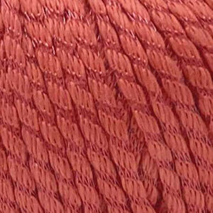 Swatch of Pima Colada yarn in Coral colorway