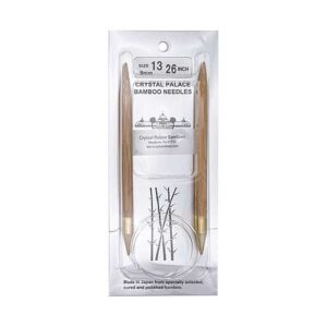 A size 13, 26 inch bamboo circular needle in its silver packaging