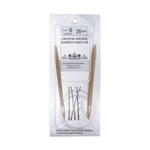 A size 9, 26 inch bamboo circular needle in its silver packaging