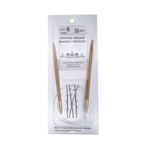 A size 8, 35 inch bamboo circular needle in its silver packaging