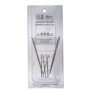 A size 2, 16 inch bamboo circular needle in its silver packaging