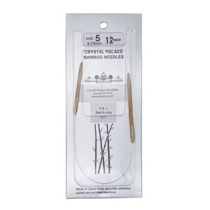 A size 5, 12 inch bamboo circular needle in its silver packaging