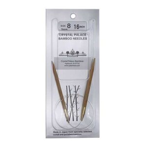 A size 8, 16 inch bamboo circular needle in its silver packaging