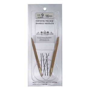 A size 9, 16 inch bamboo circular needle in its silver packaging